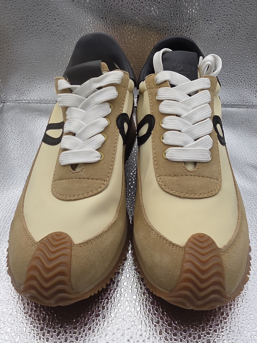 Loewe Flow Runner sneakers in gold and black